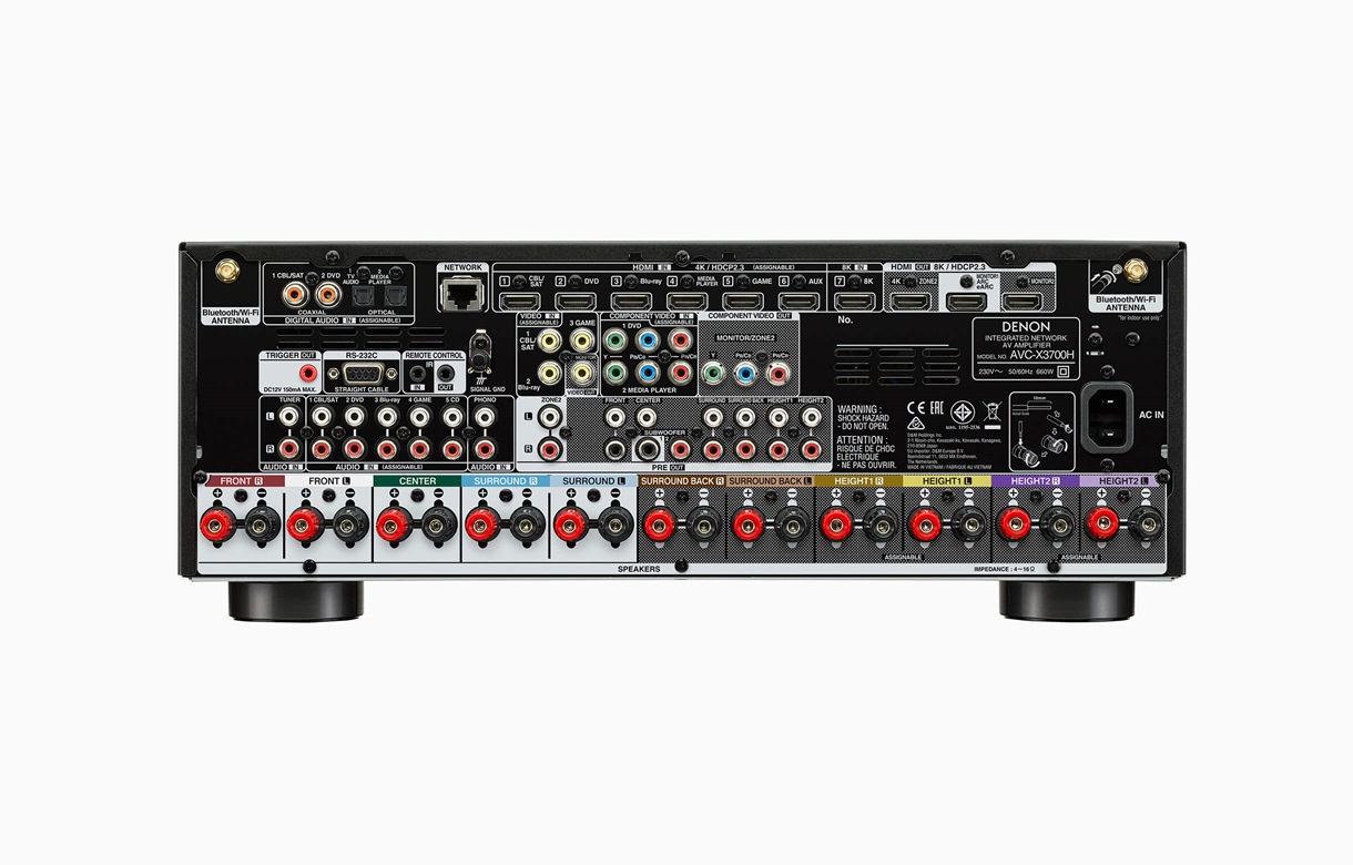 Denon Avc-X3700H Denon integrated network av receiver back panel with extensive speaker binding posts and rca input connectors.