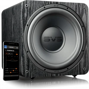 SVS subwoofer with large circular driver in a black wood-grain cabinet, beside a smartphone showing a parametric EQ app.