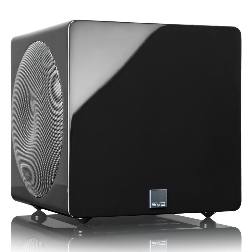 Svs 3000 Micro Subwoofer Svs black subwoofer with glossy front panel and left-side circular grille-covered driver on small feet.