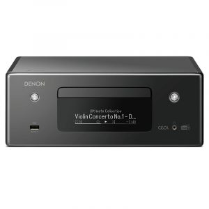 Denon Ceol compact network stereo with front display showing Violin Concerto No.1, USB port left, and right side audio jacks