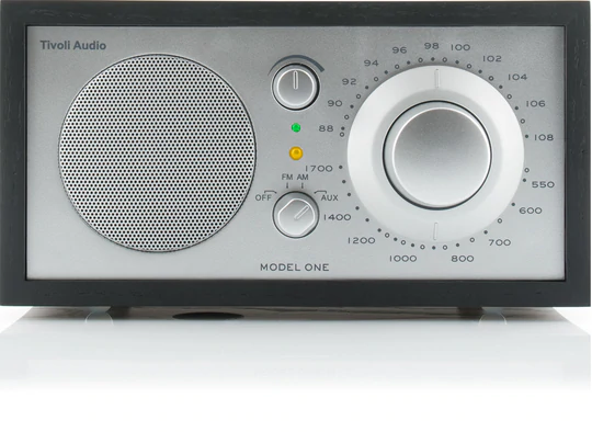 Tivoli Audio Model One Am/Fm Table Radio Tivoli audio model one radio with large circular tuning dial, speaker grille, and control knobs.