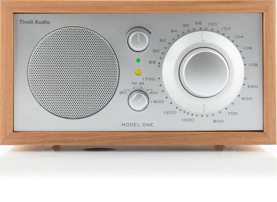 Tivoli Audio Model One Am/Fm Table Radio Tivoli audio model one wooden cabinet tabletop radio with large left speaker and circular tuning dial.