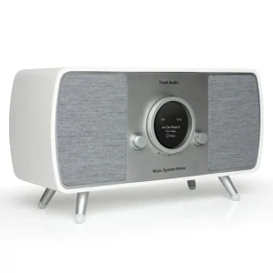 Tivoli Audio Music System Home wireless speaker with circular display, white cabinet, gray fabric grills, and metal legs.