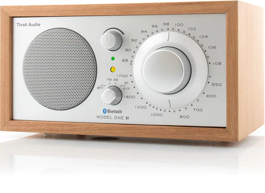 Tivoli Audio Model One Bt Bluetooth / Am / Fm Table Radio Tivoli audio model one bt wooden tabletop radio with large dial, speaker grille, and bluetooth/am/fm controls.