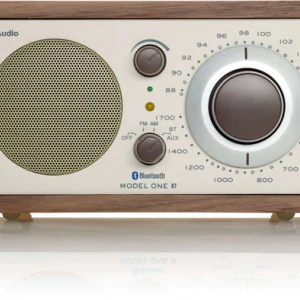 Tivoli Audio Model One BT wood cabinet radio with large circular tuning dial and perforated speaker grille.