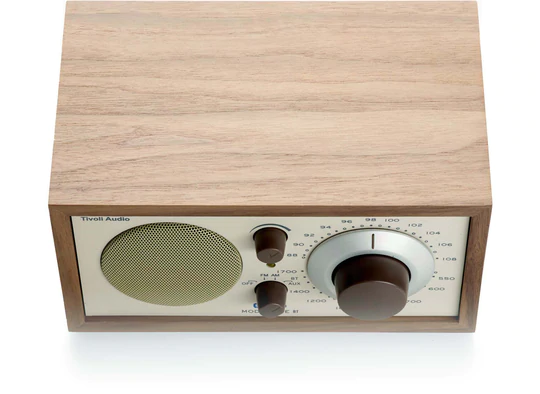 Tivoli Audio Model One Bt Bluetooth / Am / Fm Table Radio Vintage tivoli audio model one wood cabinet radio with large brown tuning dial and circular speaker grille.