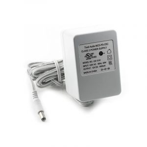 White AC-DC wall power adapter with label UD-1210, 12V DC 1000mA output, 120V input, barrel plug.