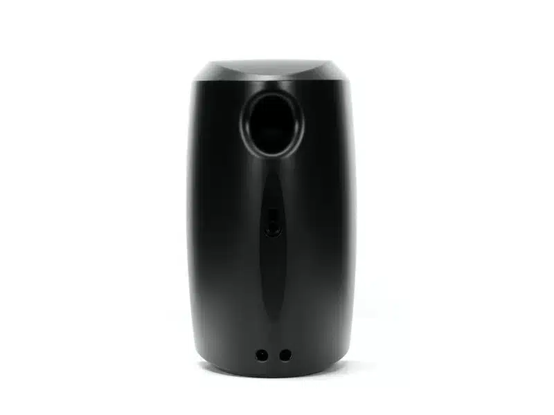 Klipsch Reference Theater Pack 5.0 Black cylindrical speaker with a large circular front opening and two small holes at the bottom.