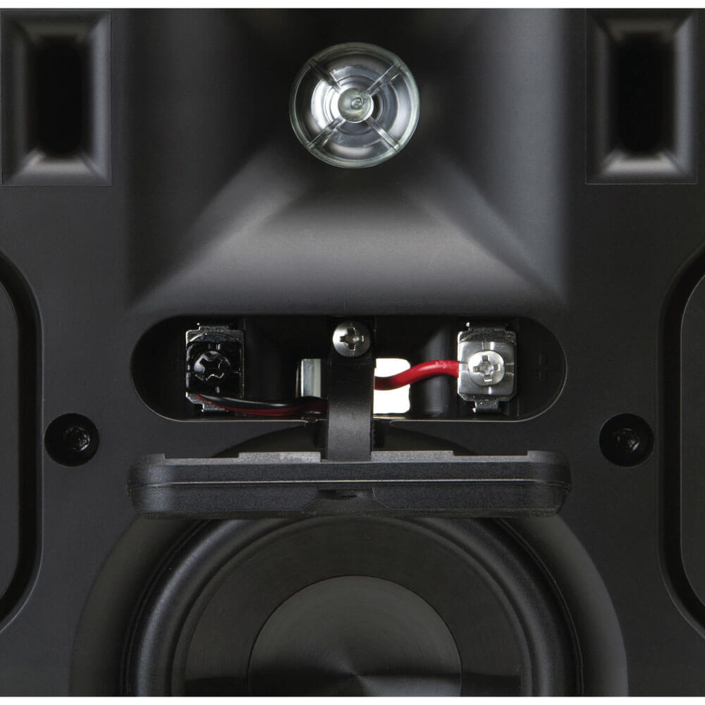 Klipsch Cp-4T - Sold As Pair Back view of a black speaker cabinet showing red and black binding posts, wiring, and a woofer.