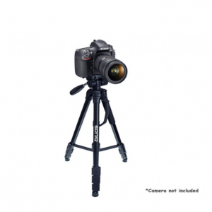 Nikon DSLR camera with zoom lens mounted on a black travel tripod.