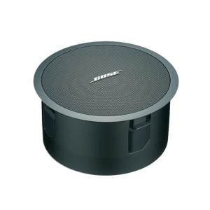 A black Bose FreeSpace 3 Flush Bass Module Series II round in-ceiling bass module with a mesh grille.