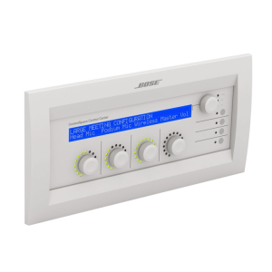 Bose ControlSpace Control Center wall-mounted audio control panel with blue LCD display and four rotary knobs.