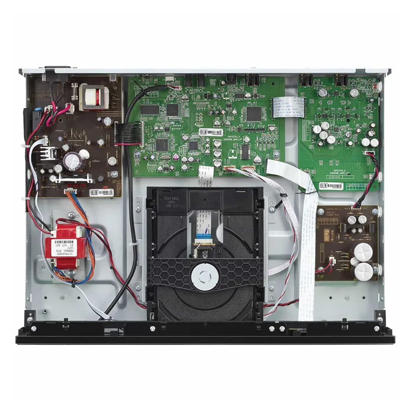 Denon Dcd-900Ne Open internal chassis of a consumer electronics device featuring a green motherboard, power supply, cables, and cooling fan.