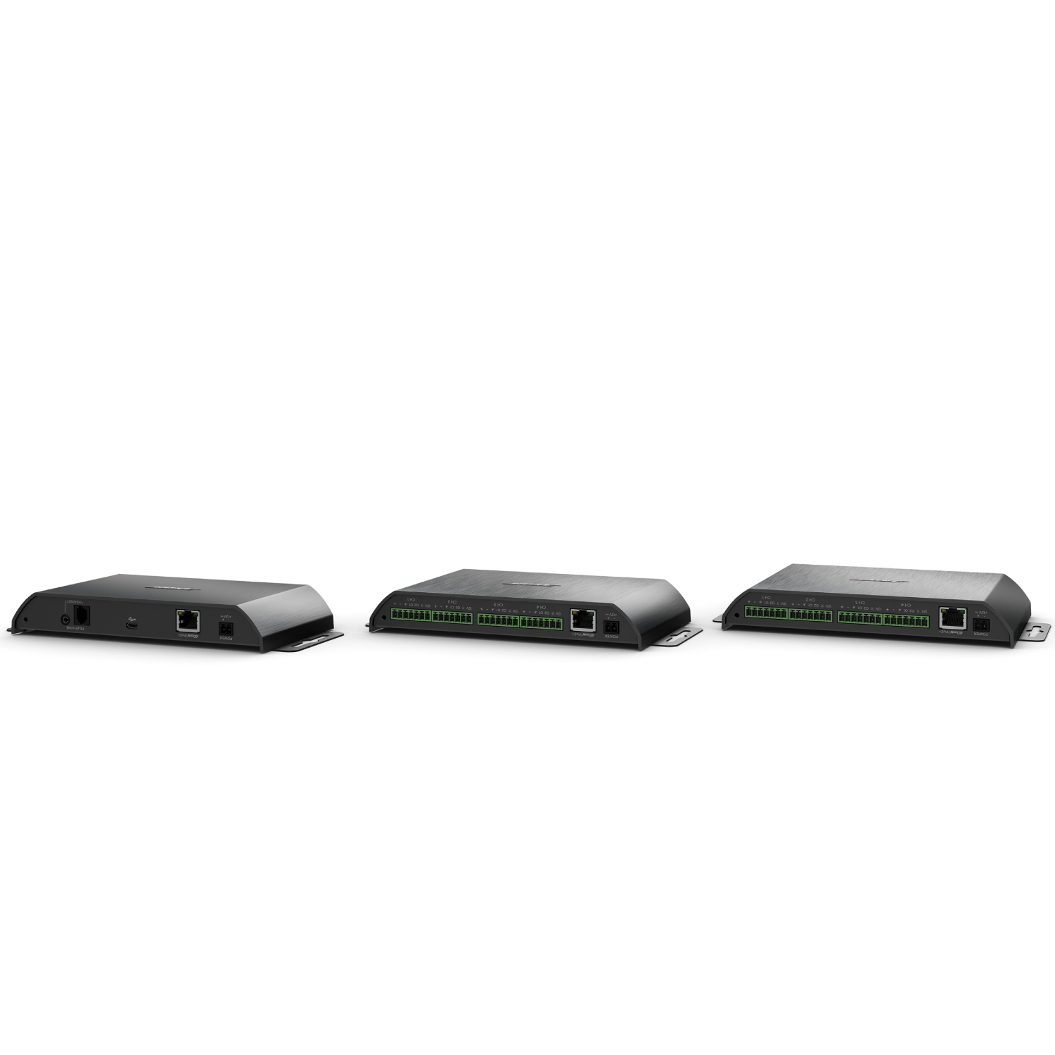 Bose Controlspace Ex-4Ml 4Ch Mic/Gpio Dante Utb Three black industrial ethernet switches with green terminal block connectors and metal housings.