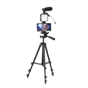Tripod with smartphone holder, LED light panel, and microphone mounted above for mobile video recording.
