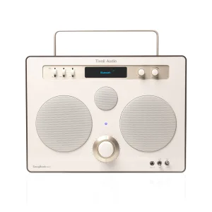 Tivoli Audio SongBook Max portable Bluetooth speaker with two large front speakers, a central control knob, and a top display.