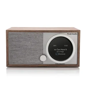 Tivoli Audio Model One Digital wooden tabletop radio with fabric speaker grille and round digital display.