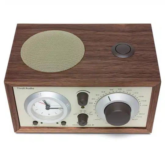 Tivoli Audio Model Three Bt Tivoli audio wooden am/fm table radio with analog clock, large tuning dial and brass speaker grille.
