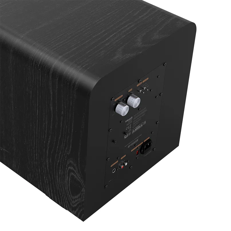 Klipsch Rp-1000Sw Black wood-grain subwoofer with rear panel featuring two white knobs, connectors, and power input.