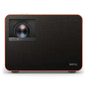 BenQ X Series projector with orange trim, honeycomb-patterned front, large left lens, and compact desktop design.