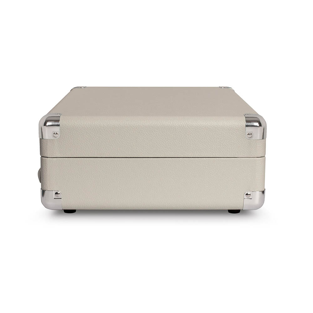 Crosley Cruiser White Sands - Bluetooth Portable Turntable Beige hard-shell case with chrome corner protectors and reinforced metal fittings.