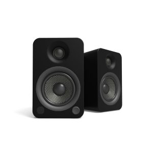 Pair of black bookshelf speakers with carbon-fiber woofers and small top tweeters.