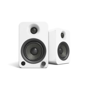 Pair of white bookshelf speakers with black carbon-fiber woofers, tweeters, and rounded corners.
