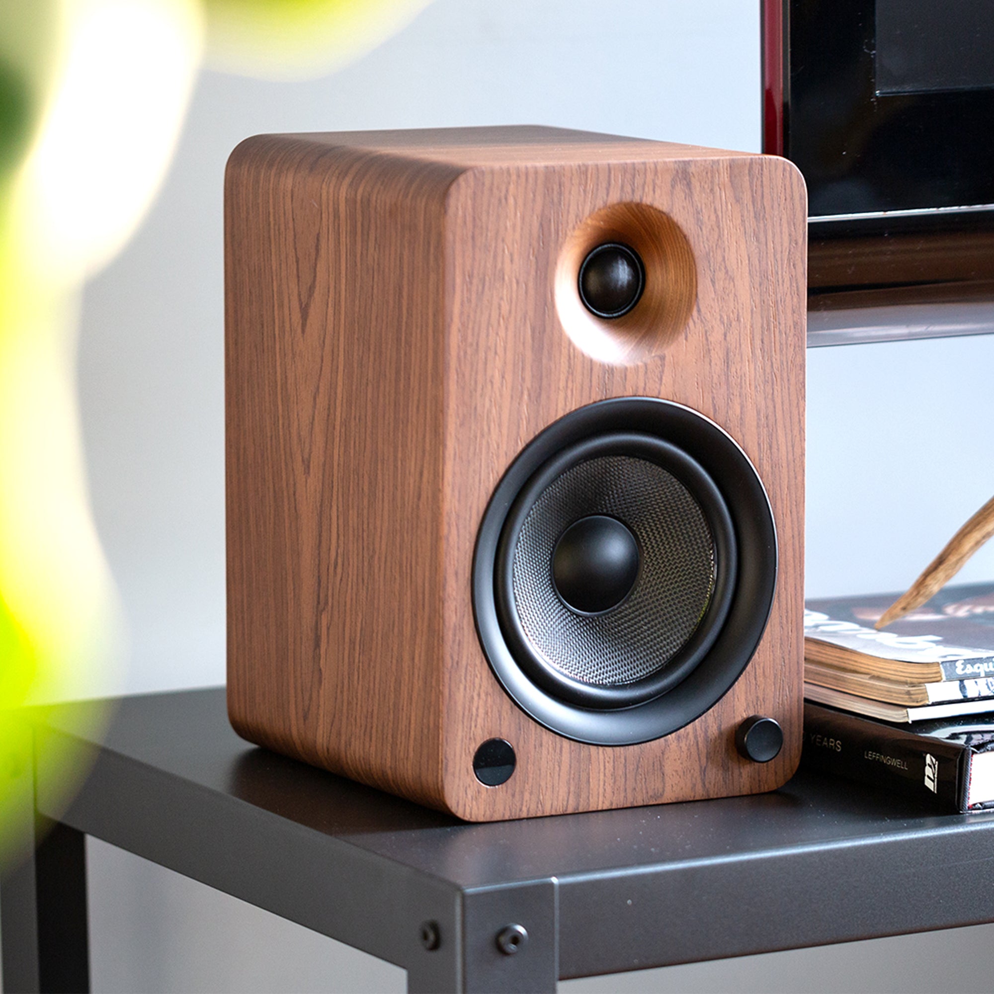 Kanto Yu6 200W Powered Bookshelf Speakers With Bluetooth® And Phono Preamp - Pair, Walnut Walnut-finished bookshelf speaker with a small tweeter and large woofer, rounded edges.