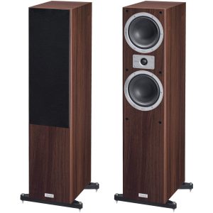 Magnat floorstanding speakers in dark walnut veneer, one with grille, the other exposing dual large drivers and a central tweeter.