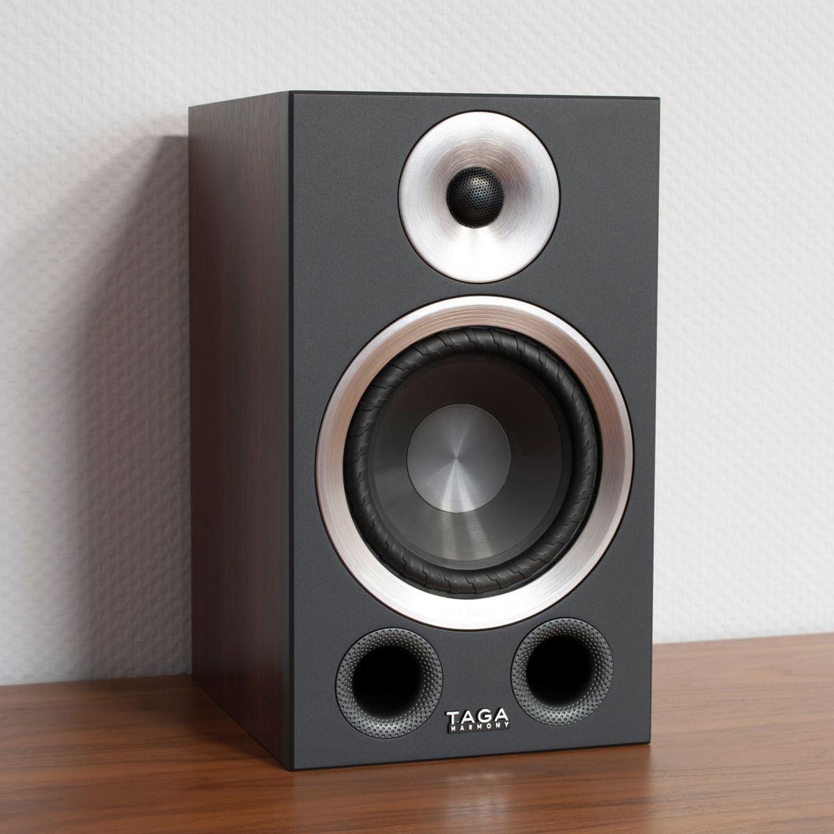 Taga Harmony Azure B-40 V.3 Bookshelf Speakers Taga harmony bookshelf speaker with large woofer, small tweeter, and two front bass ports.