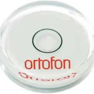 Interdyn Ortofon circular white disc with red logo and central black ring, likely a turntable cartridge accessory.