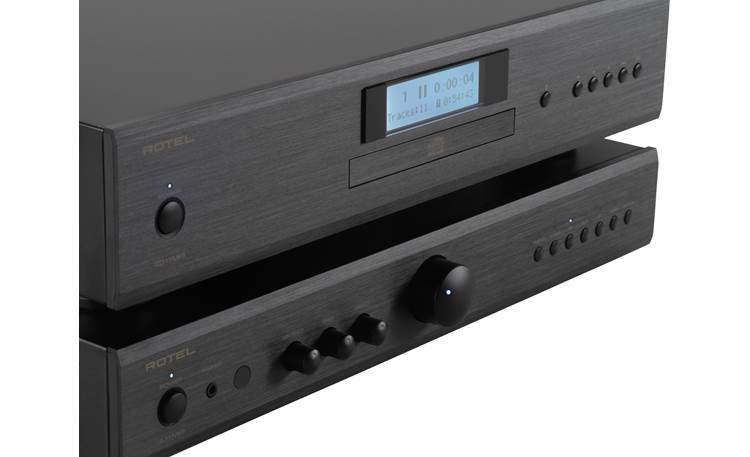 Rotel Cd11Mkii Cd Player Rotel stereo system with top cd player and bottom integrated amplifier in dark brushed metal finish.
