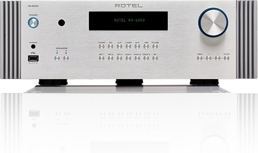 Rotel Ra-6000 Integrated Amplifier Rotel ra-6000 stereo integrated amplifier with brushed aluminum front panel, black display, and large blue-accent volume knob.