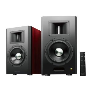 Pair of black bookshelf speakers with large woofer and square top port, accompanied by a remote control.