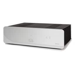 Integrated stereo amplifier with silver front panel, black top, and circular logo in the center.