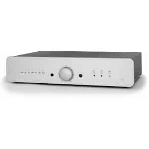 Integrated stereo amplifier IN50 with white front panel, large central volume knob, left input indicators, and right playback buttons