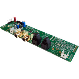 Green PCB audio interface board with RCA jacks, trim potentiometers, and white connectors.