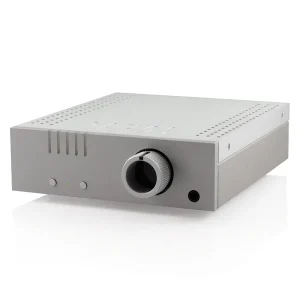 Gray metal audio amplifier with a large central knurled volume knob, two small front buttons, LED indicator, and vented top.