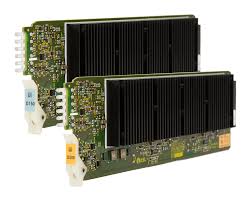 Asl D150 Two pcie graphics cards with large black finned heatsinks on green pcbs.