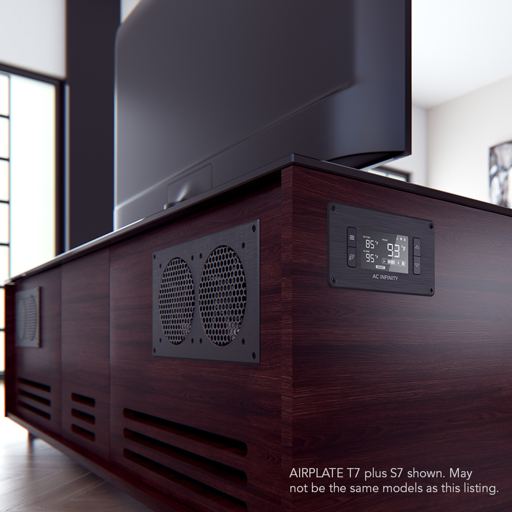 Ac Infinity Airplate T7 Airplate t7 plus kitchen island range hood on dark wood cabinetry with circular perforated metal vents.