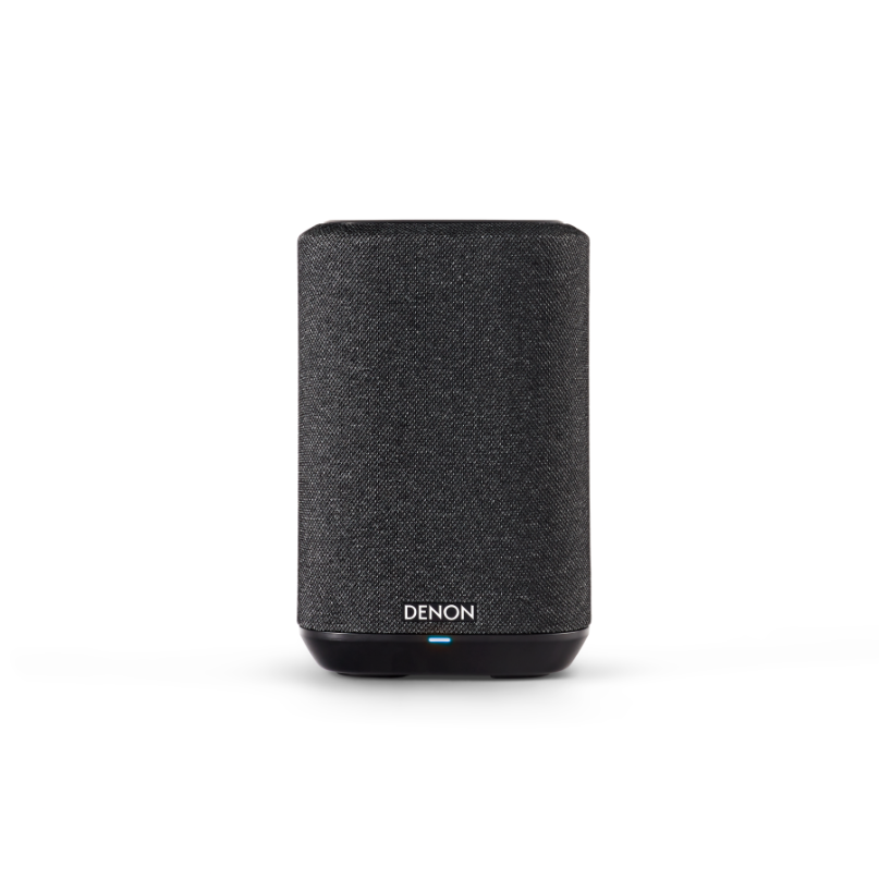 Denon Home 150 Nv Compact Speaker Denon compact wireless speaker with dark fabric grille and blue indicator light.