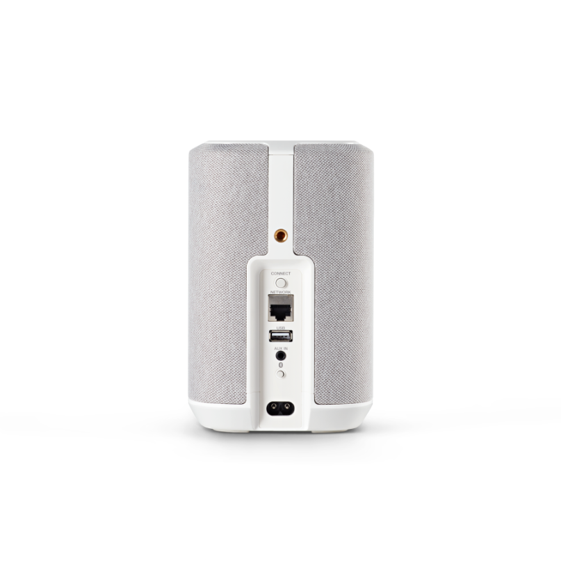 Denon Home 150 Nv Compact Speaker Wireless speaker with fabric-covered sides and white base; rear panel shows ethernet, usb, aux, and power connectors.