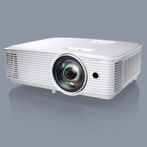 White multimedia projector with a prominent circular lens and horizontal vented sides.