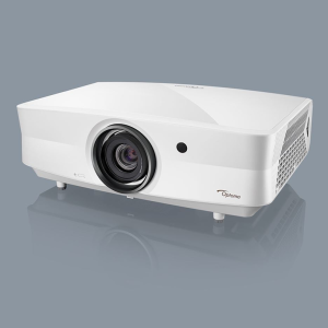 Optoma projector with large front lens, white rectangular body, side ventilation grille, supported by small feet.