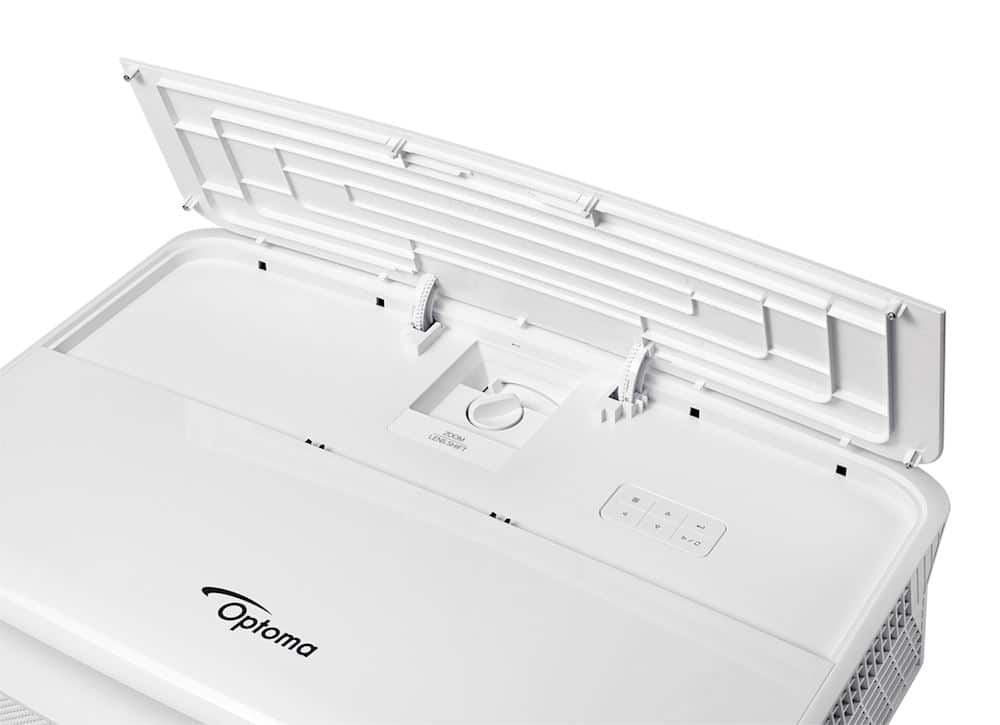 Optoma Zk507 Optoma white appliance with hinged open lid, showing internal dials and front control panel with vent grill.