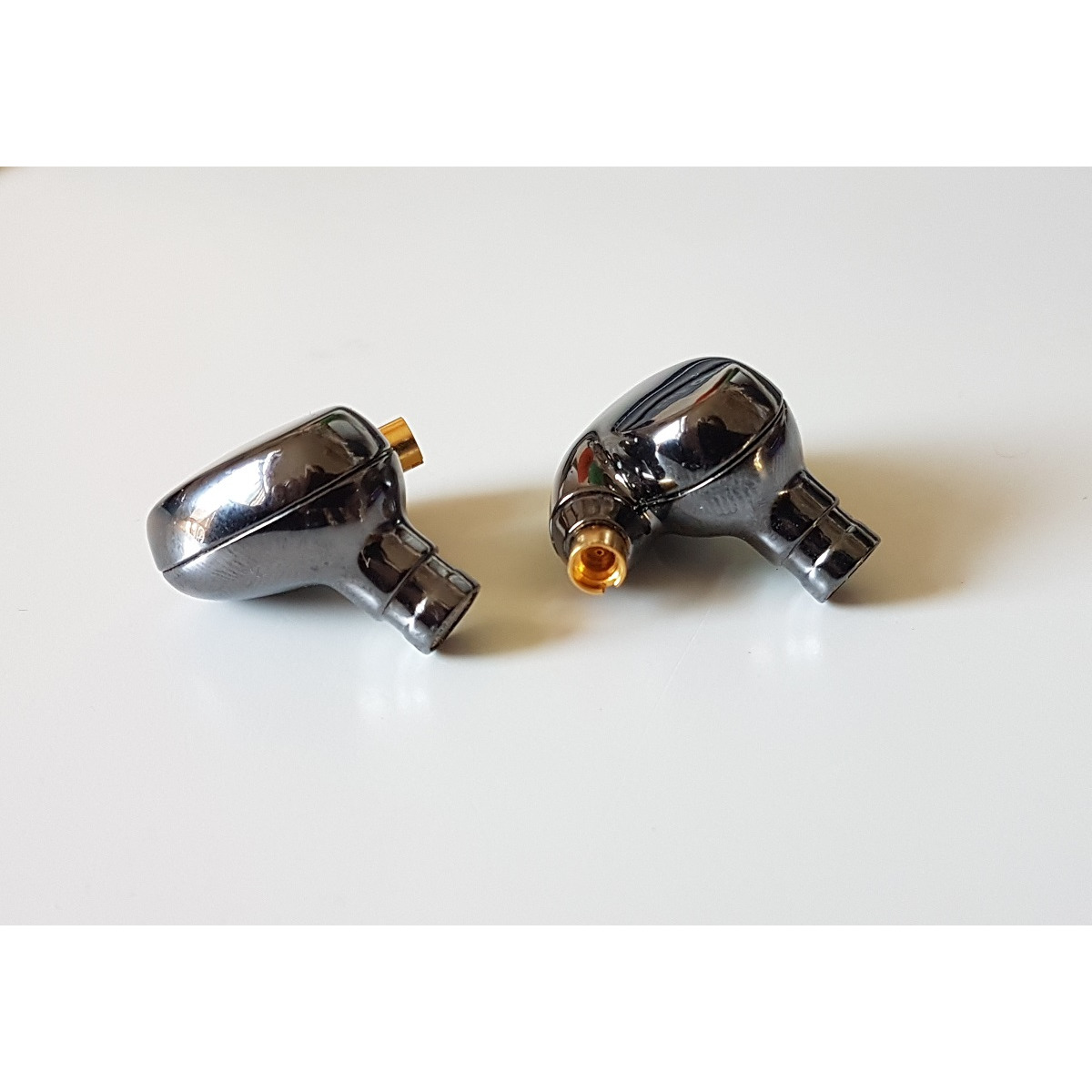 Obravo Cupid Basic Pair of chrome in-ear monitors with gold detachable connectors.