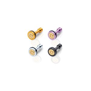 Four anodized cufflinks with round gold-toned centers and colored rims in orange, purple, silver, and black.