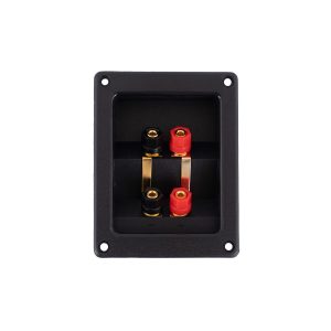 Rectangular speaker terminal panel with four binding posts (two red, two black) and gold-plated contacts.
