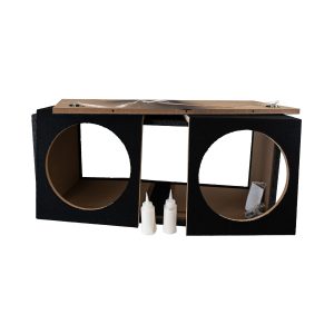 Unfinished black speaker cabinet with two circular cutouts, cardboard interior, and wiring on top.