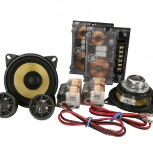 Car audio component speaker kit with 6.5-inch yellow-cone woofer, two tweeters, crossovers, and wiring by DLS Sweden.